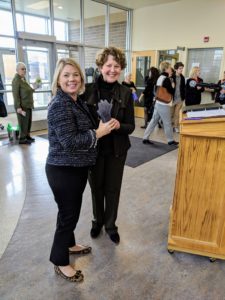 Congresswoman Susan Brooks (right) accepts her Faces of Hope award from Hope Academy Board President Amy Levander.